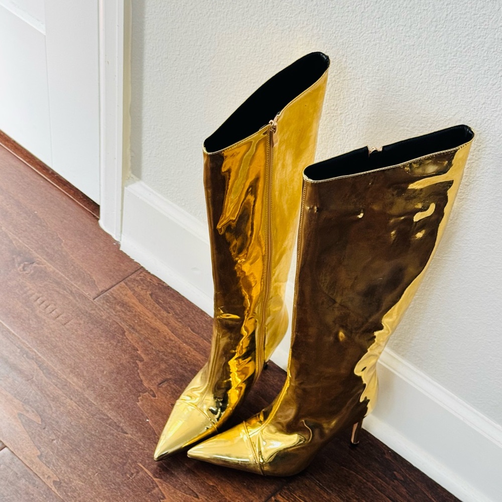 Knee high gold metallic boots